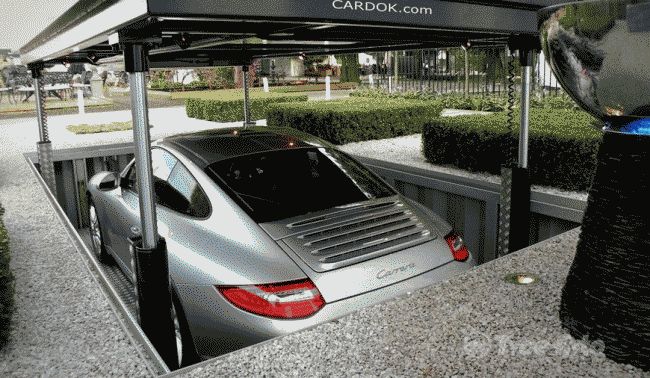 Швейцарцы придумали гараж который прячется под землю 