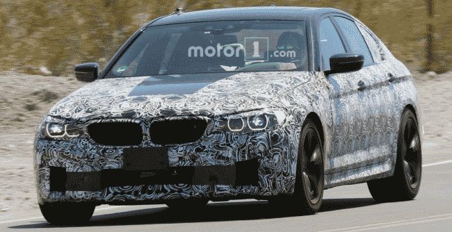 Новый BMW M5 впервые заметили на тестах 